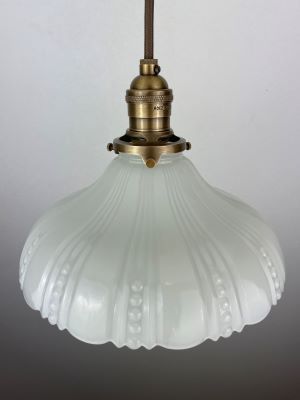Elegance Illuminated: The Timeless Beauty of Antique Milk Glass Lighting